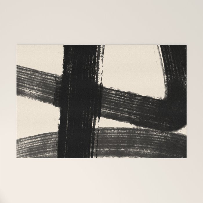 Abstract Minimalist Painted Brushstrokes in Black and Almond Cream 1 Welcome Mat Gallery Image 1