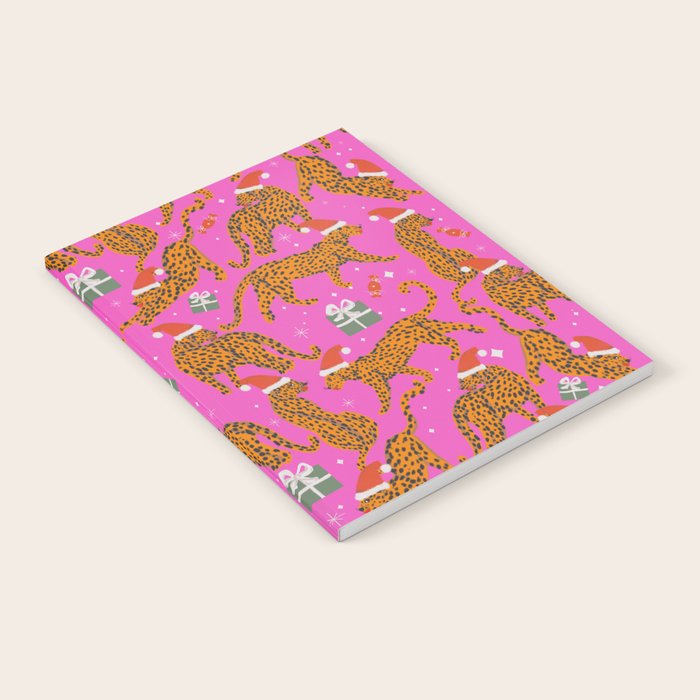 Fashionable cats with Christmas hats and gifts in fuchsia pink background  Notebook