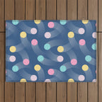 Colorful pastel tennis balls over blue background pattern Outdoor Rug Gallery Image 1