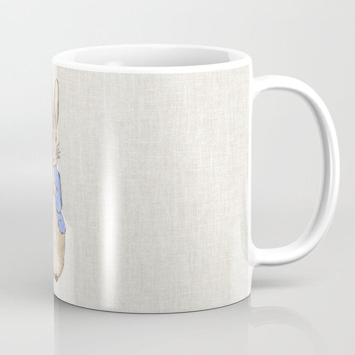 Peter the rabbit beige linen textured background Coffee Mug Gallery Image 1