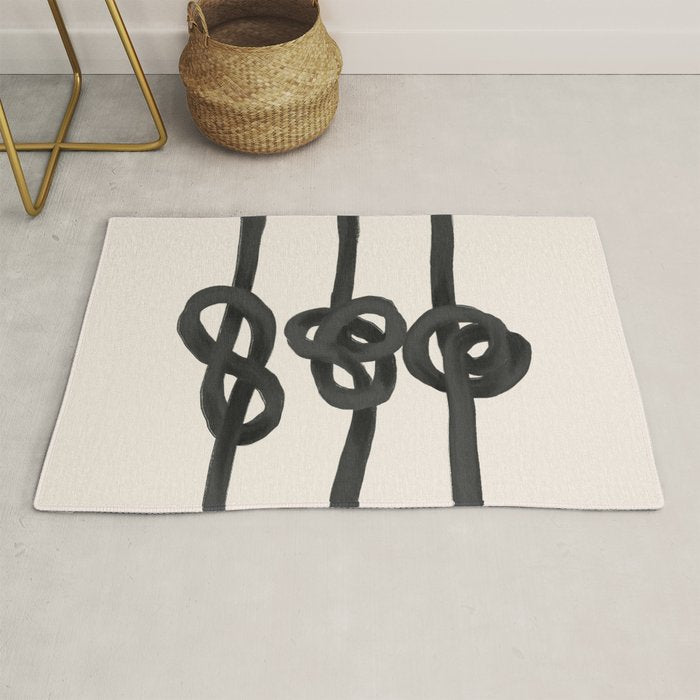 Minimalist Black Knot Abstract Art on Neutral Background Rug Gallery Image 1