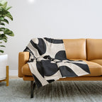 Contemporary Modern Abstract Soft Curves Pattern in Black and Almond Cream Throw Blanket Gallery Image 1