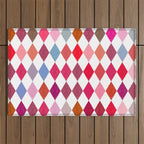 Festive Harlequin Diamond Pattern in Warm Tones Outdoor Rug Gallery Image 1