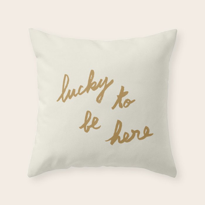 Lucky To Be Here - Brush Script Typography Quote - Gold Throw Pillow Gallery Image 1