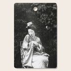 Seated Geisha with mask black and white vintage garden photograph still life by Arnold Genthe Cutting Board Gallery Image 1