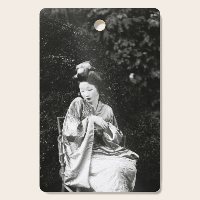 Seated Geisha with mask black and white vintage garden photograph still life by Arnold Genthe Cutting Board Gallery Image 1