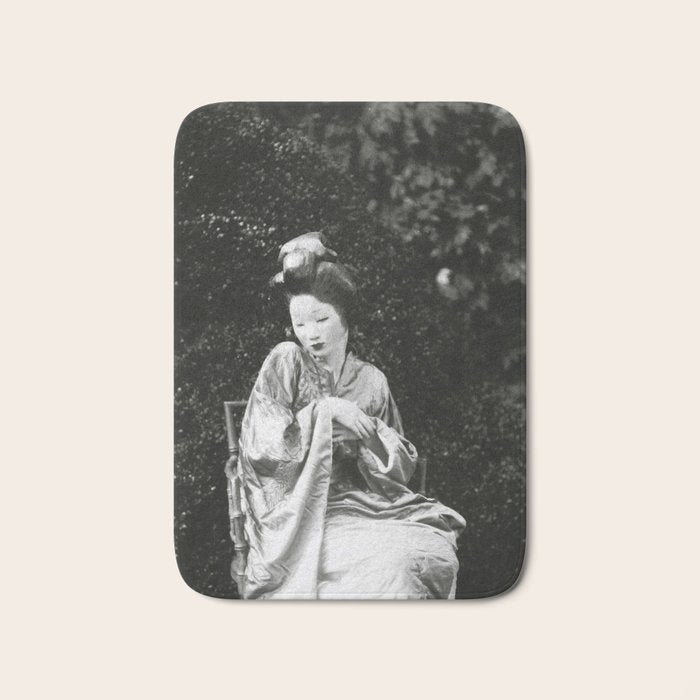 Seated Geisha with mask black and white vintage garden photograph still life by Arnold Genthe Bath Mat Gallery Image 1