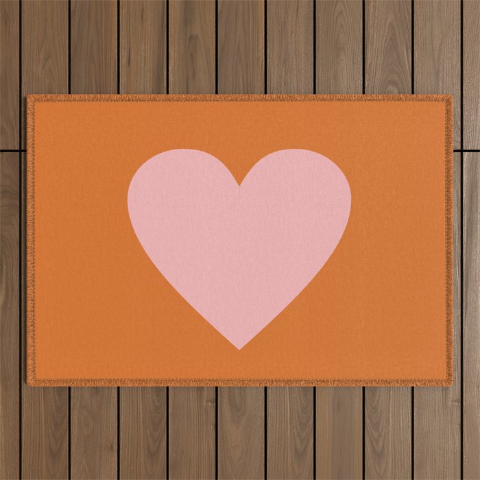 Cute Pink Heart on Orange Minimal Outdoor Rug Gallery Image 1