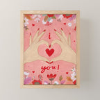 Women hands making love sign Mini Art Print Gallery Image 1