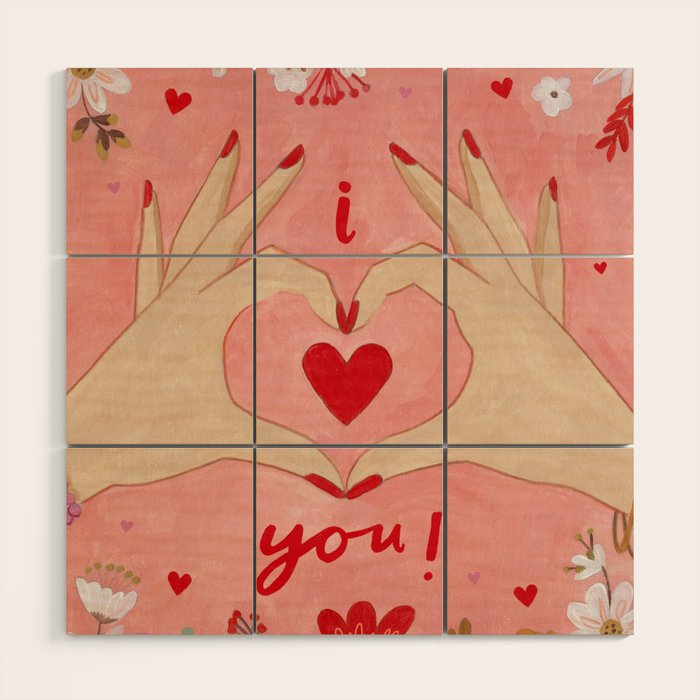 Women hands making love sign Wood Wall Art Gallery Image 1