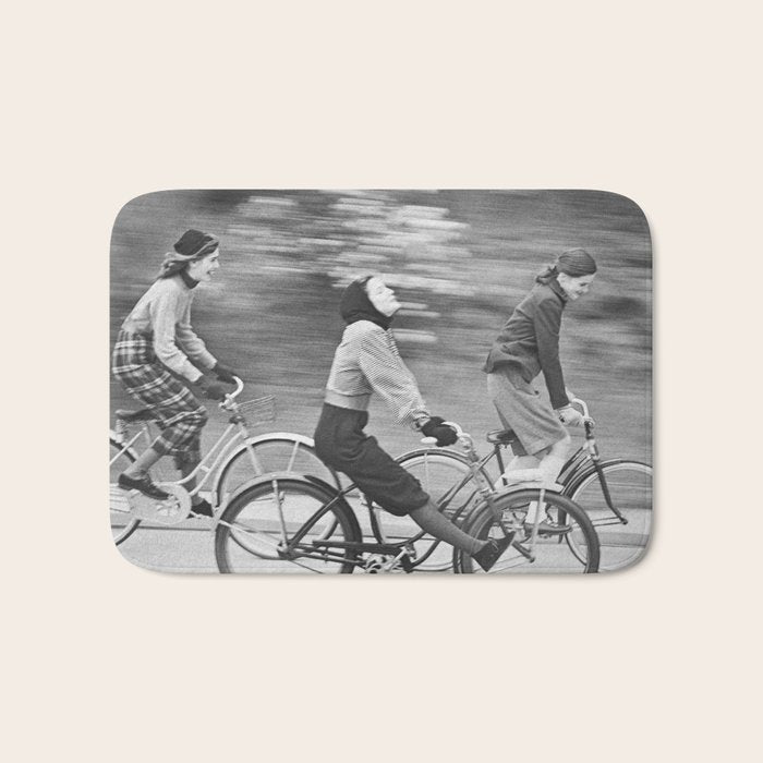 Women Riding Bicycles black and white photography / black and white photographs Bath Mat Gallery Image 1