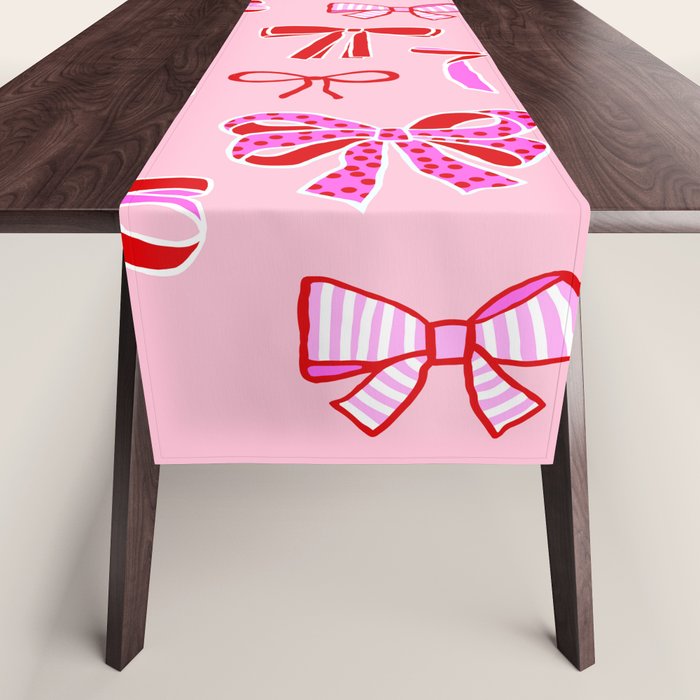 Festive Pink and Red Christmas Ribbons and Bows hand drawn Collection on Pastel Pink Table Runner Gallery Image 1