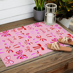 Festive Pink and Red Christmas Ribbons and Bows hand drawn Collection on Pastel Pink Outdoor Rug Gallery Image 2