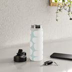 Serenity Abstract Pebbles White on Pastel Blue Sky Water Bottle Gallery Image 4