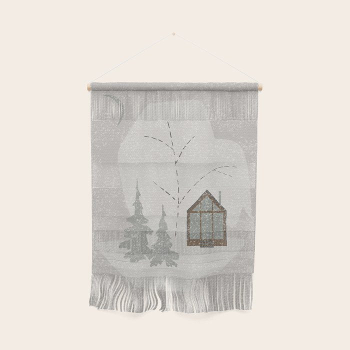 a wooden house in a snowy forest Wall Hanging Gallery Image 1