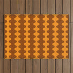 Retro 70s Mid Century Ogee A-Go-Go Wobbly Vertical Stripes Brown and Orange Outdoor Rug Gallery Image 1
