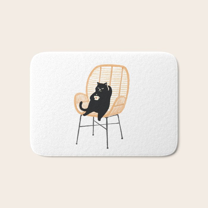 Lazy cat 2 enjoying coffee on rattan chair  Bath Mat Gallery Image 1