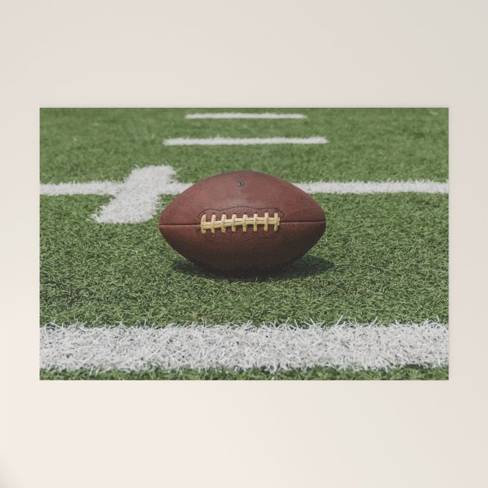 American Football Court with ball on Gras Welcome Mat Gallery Image 1
