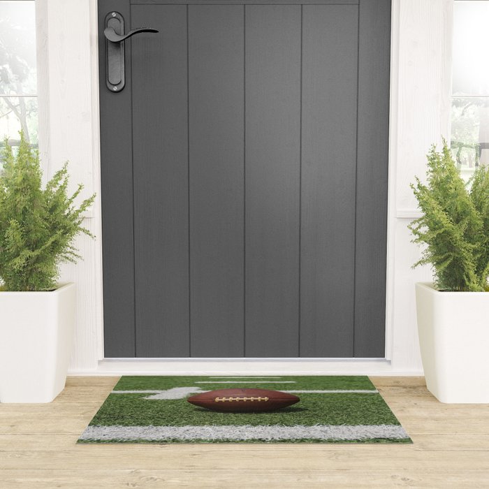American Football Court with ball on Gras Welcome Mat Gallery Image 3
