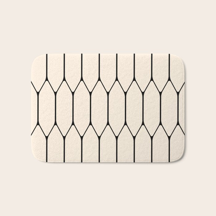 Long Honeycomb Geometric Minimalist Pattern in Almond Cream and Black Bath Mat Gallery Image 1