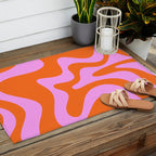 Retro Liquid Swirl Abstract Pattern in Hot Pink and Red-Orange Outdoor Rug Gallery Image 2