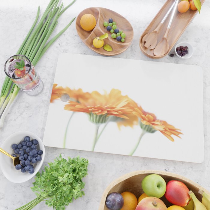 Orange hazy gerbera daisy  Floral spring and summer nature photography  Cutting Board Gallery Image 2