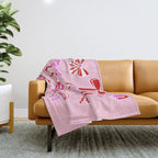 Festive Pink and Red Christmas Ribbons and Bows hand drawn Collection on Pastel Pink Throw Blanket Gallery Image 1