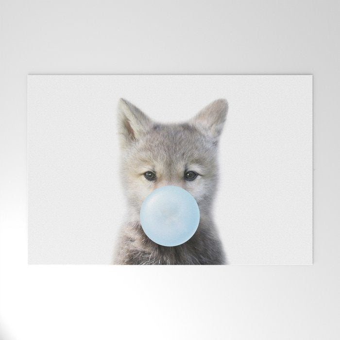 Baby Wolf Blowing Blue Bubble Gum, Baby Boy, Kids, Baby Animals Art Print by Synplus Welcome Mat Gallery Image 1