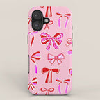 Festive Pink and Red Christmas Ribbons and Bows hand drawn Collection on Pastel Pink iPhone Case Gallery Image 1