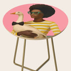 Stylish Woman Holding Goose in Striped Dress Side Table Gallery Image 2
