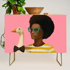 Stylish Woman Holding Goose in Striped Dress Credenza Gallery Image 1