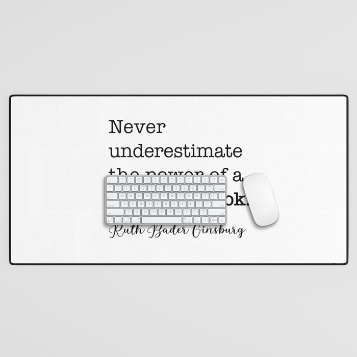 Never underestimate the power of a girl with a book. Desk Mat Gallery Image 1