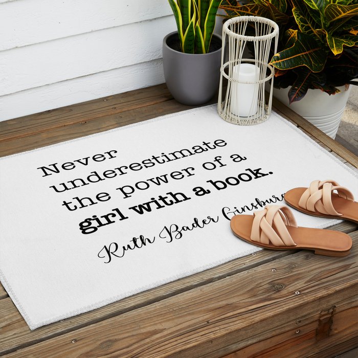 Never underestimate the power of a girl with a book. Outdoor Rug Gallery Image 2