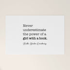 Never underestimate the power of a girl with a book. Welcome Mat Gallery Image 1