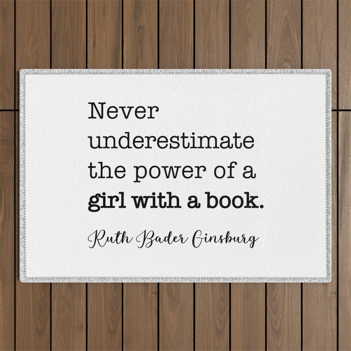 Never underestimate the power of a girl with a book. Outdoor Rug Gallery Image 1