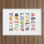 Decorative Alphabet Outdoor Rug Gallery Image 1