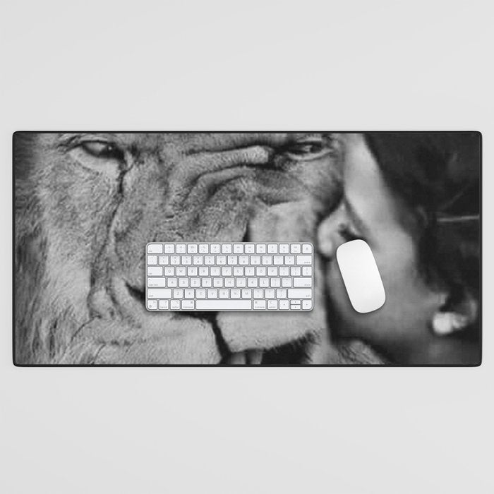 Grouchy Lion being kissed by brunette girl black and white photography Desk Mat Gallery Image 1
