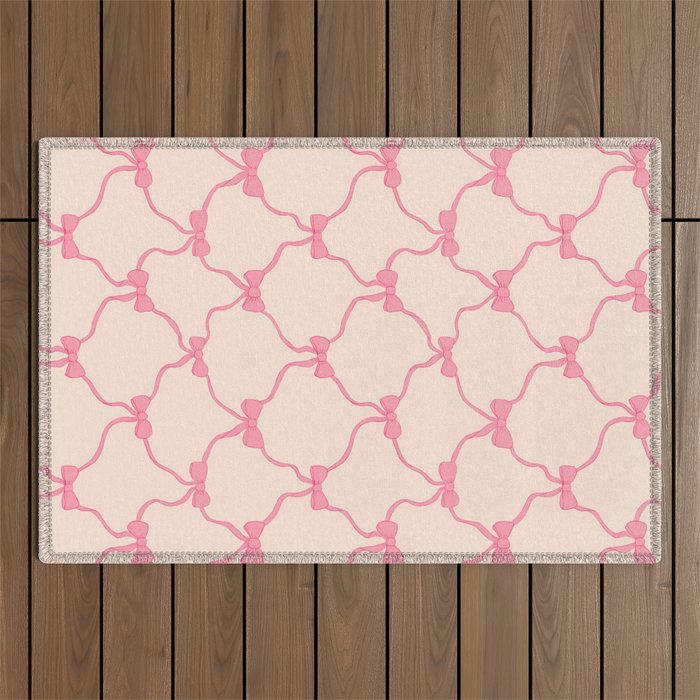 Coquette style ribbons and bows pattern in pink Outdoor Rug Gallery Image 1