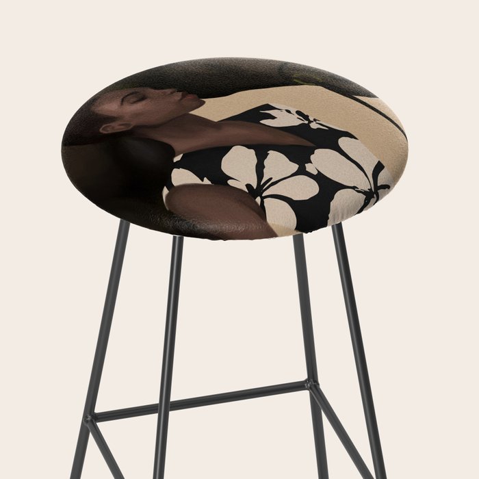 Woman in Bold Print with Black Horse Stool Gallery Image 2