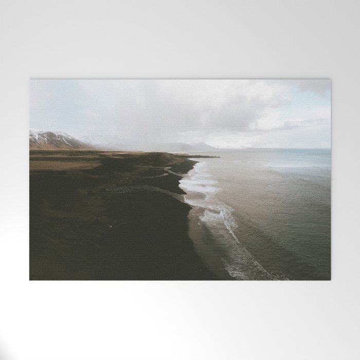 Moody black sand beach in Iceland - Landscape Photography Welcome Mat Gallery Image 1