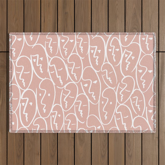 faces (pink) Outdoor Rug Gallery Image 1