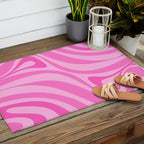 New Groove Retro Swirl Abstract Pattern in Doll Pink Outdoor Rug Gallery Image 2