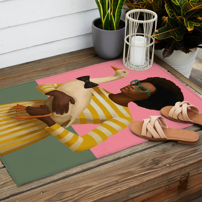 Stylish Woman Holding Goose in Striped Dress Outdoor Rug Gallery Image 2