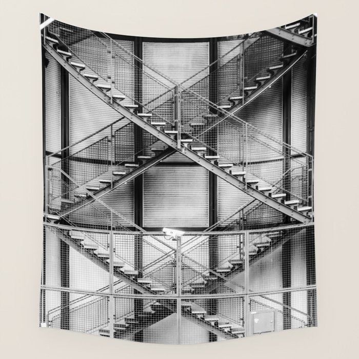 Escape from New York fire escape symmetrical steel staircase architecture black and white photograph Wall Tapestry Gallery Image 1