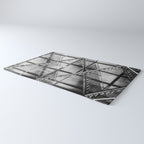 Escape from New York fire escape symmetrical steel staircase architecture black and white photograph Rug Gallery Image 3