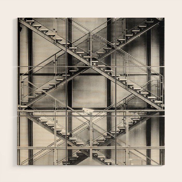 Escape from New York fire escape symmetrical steel staircase architecture black and white photograph Wood Wall Art Gallery Image 1