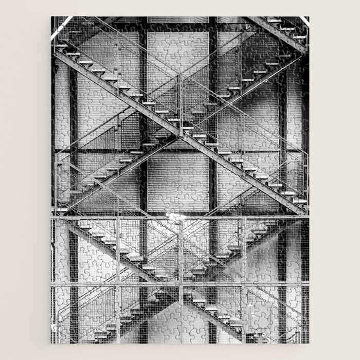 Escape from New York fire escape symmetrical steel staircase architecture black and white photograph Jigsaw Puzzle Gallery Image 1