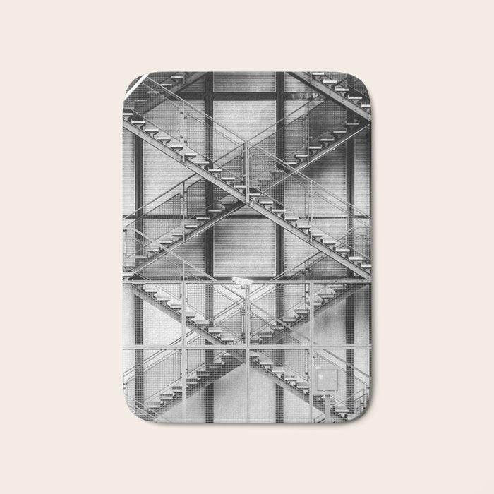 Escape from New York fire escape symmetrical steel staircase architecture black and white photograph Bath Mat Gallery Image 1