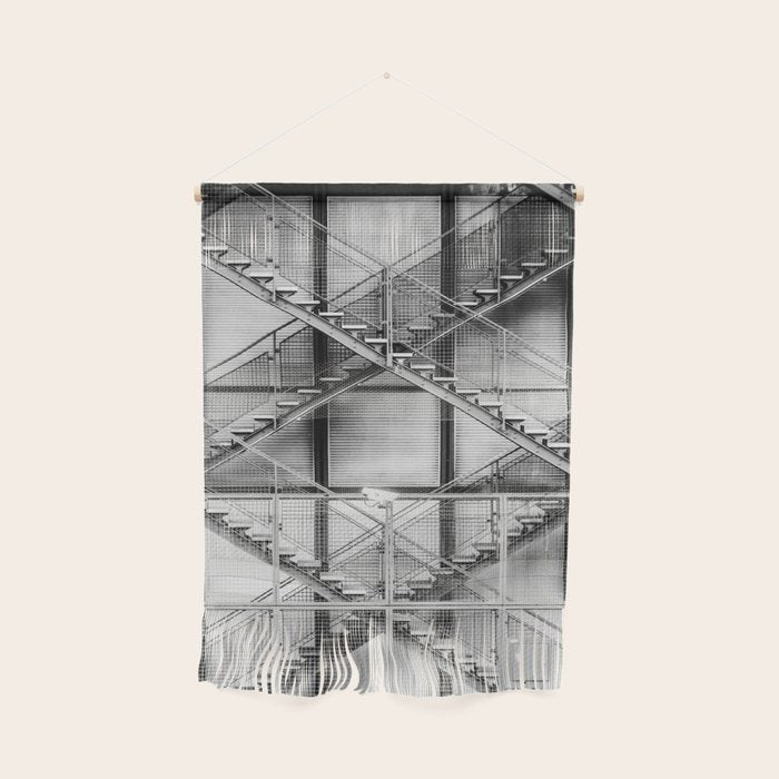 Escape from New York fire escape symmetrical steel staircase architecture black and white photograph Wall Hanging Gallery Image 1