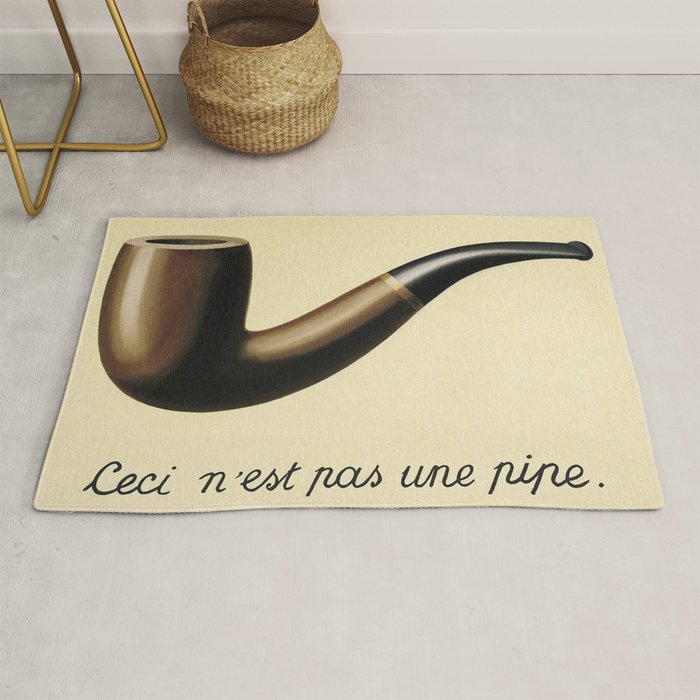 The Treachery of Images (This is not a pipe) by Rene Magritte Rug Gallery Image 1